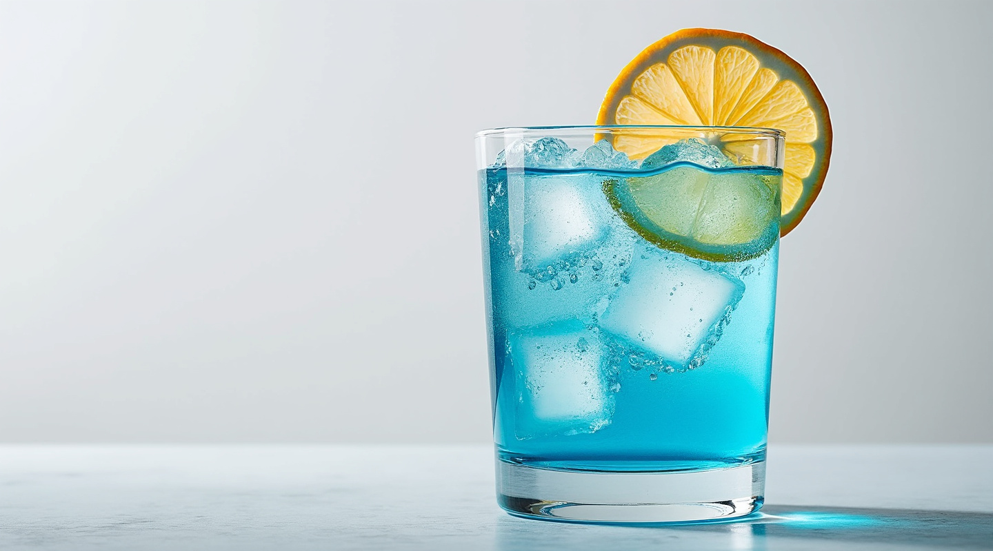 Am I Blue? cocktail with a dehydrated grapefruit slice garnish